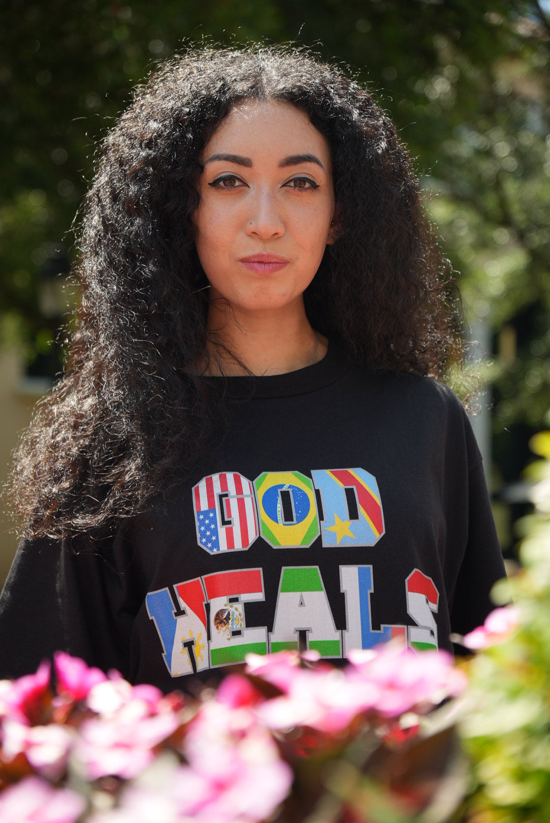 God Heals International Black Tee