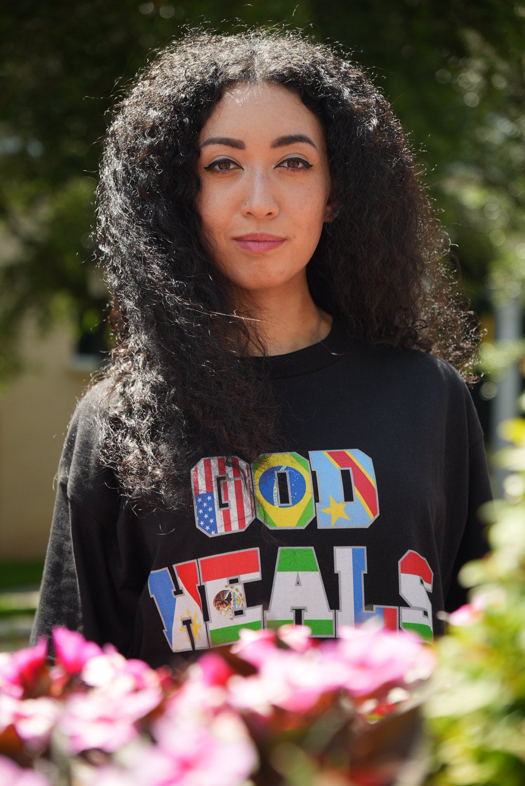 God Heals International Black Tee