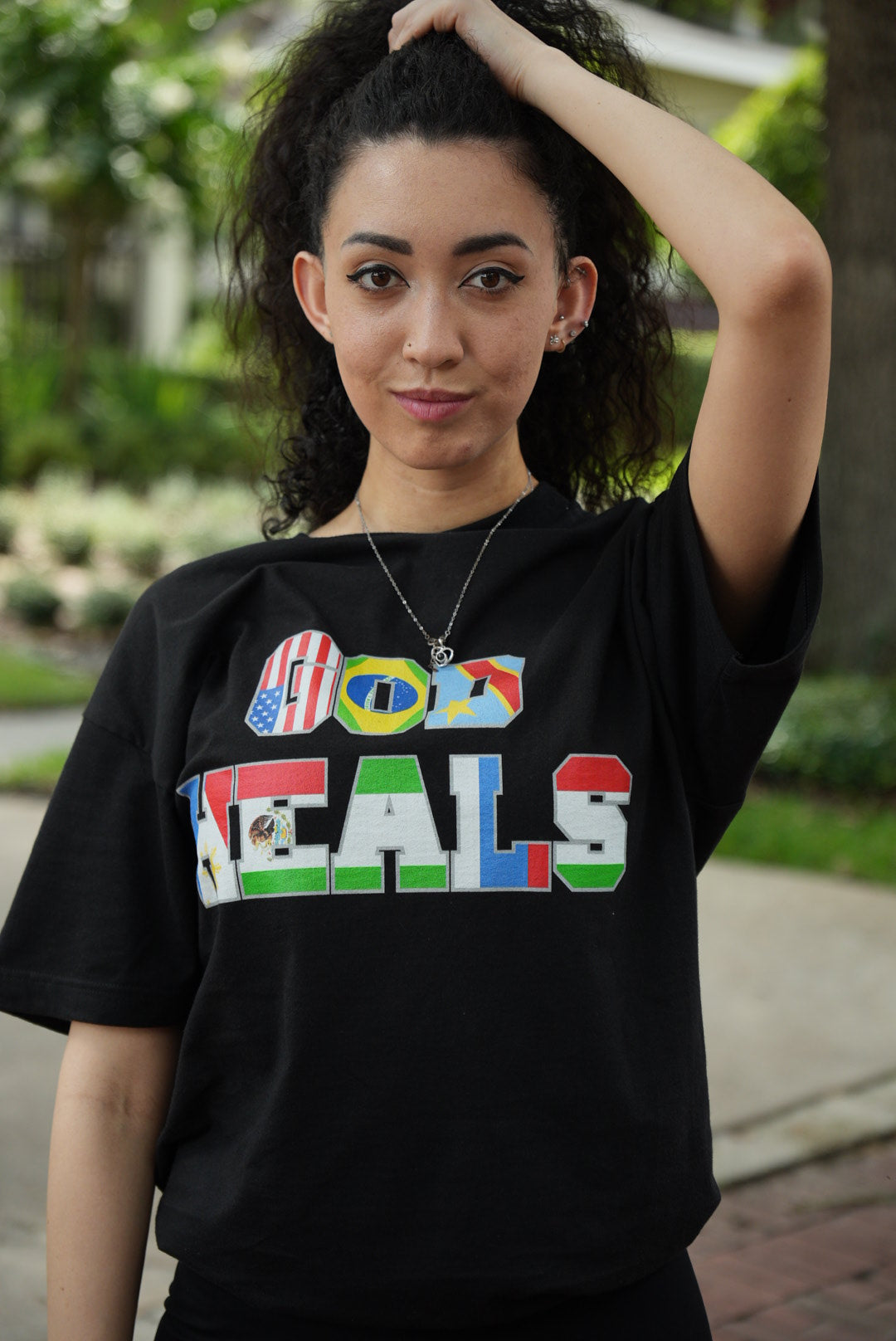 God Heals International Black Tee